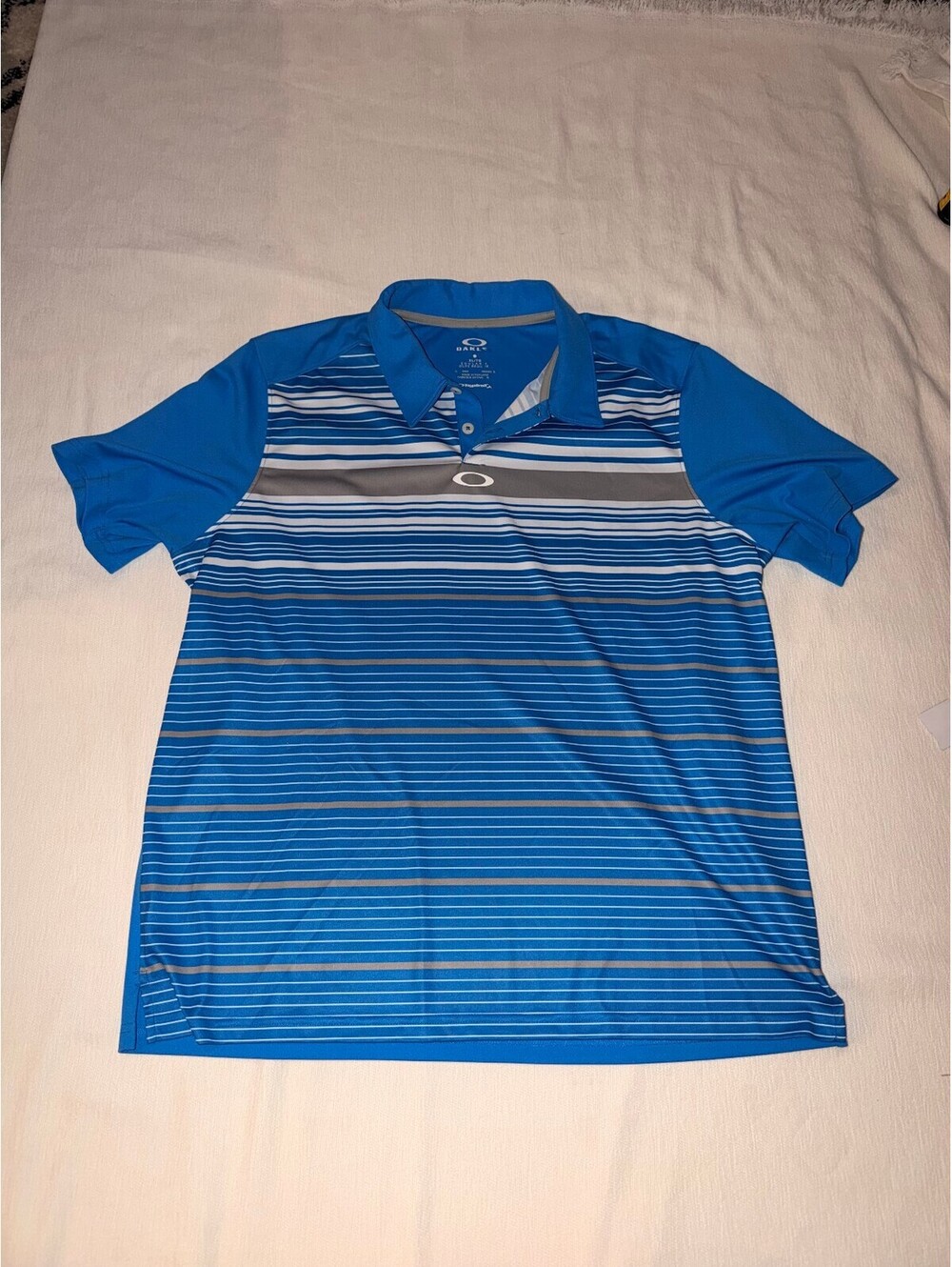 Oakley Men's XL Blue Hydrolix Polo Shirt with Striped Front Design